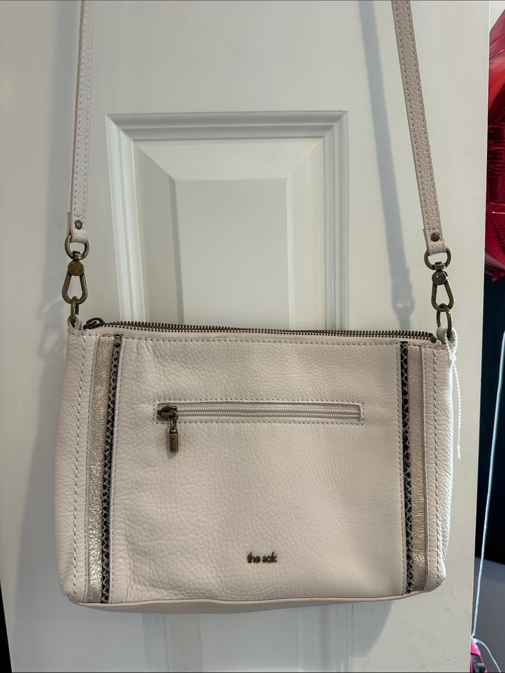 The Sak Leather Crossbody Bag in Soft White with Metallic & Snake Trim